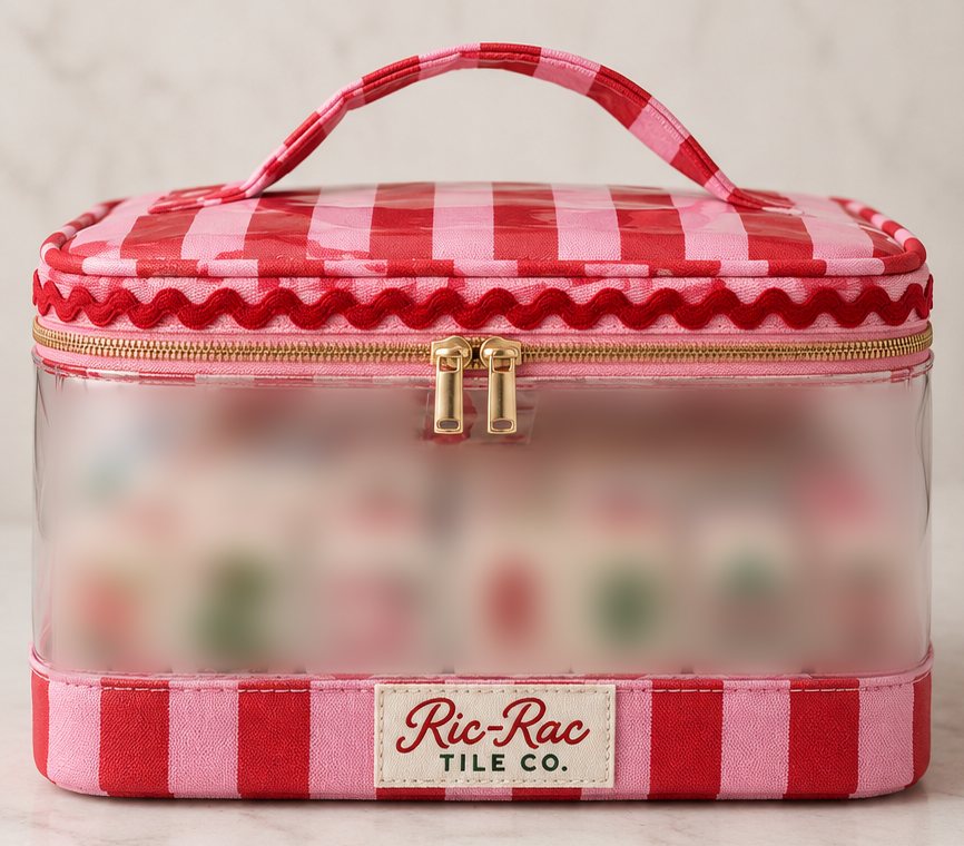A pink and red striped carry case with a frosted window and a Ric-Rac Tile Co. label